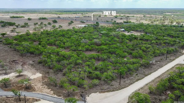 a view of a yard with an outdoor space