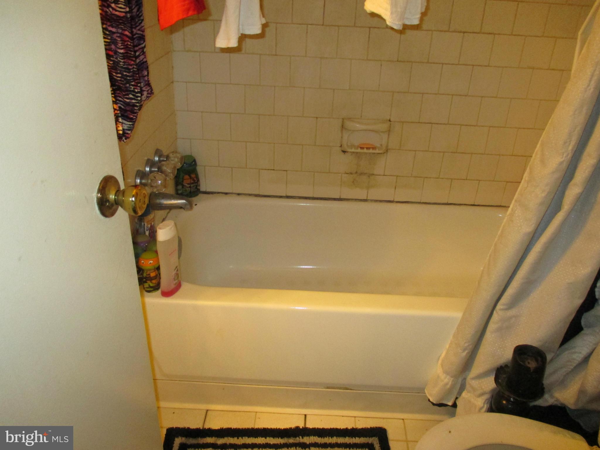 17428 Hoskinson Road Poolesville, MD 20837 - Photo 8 of 12 a bathroom with a shower