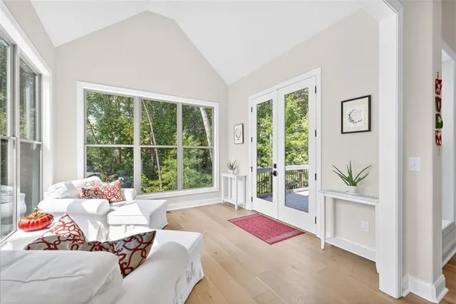 a bathroom with a sink a toilet and shower curtain