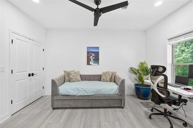 an aerial view of house with yard swimming pool and outdoor seating