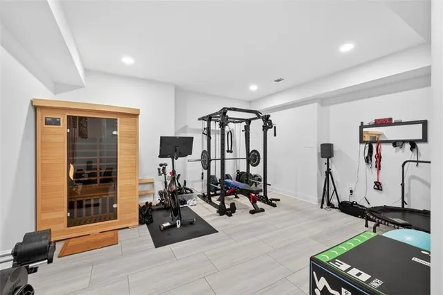 an aerial view of a house with a swimming pool