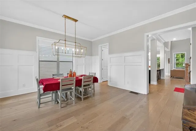 a living room with furniture fireplace and window