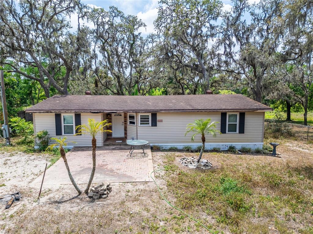 13907 Raulerson Road, Unit PARCEL A Riverview, FL 33569 - Photo 2 of 30 a house that has a tree in front of it
