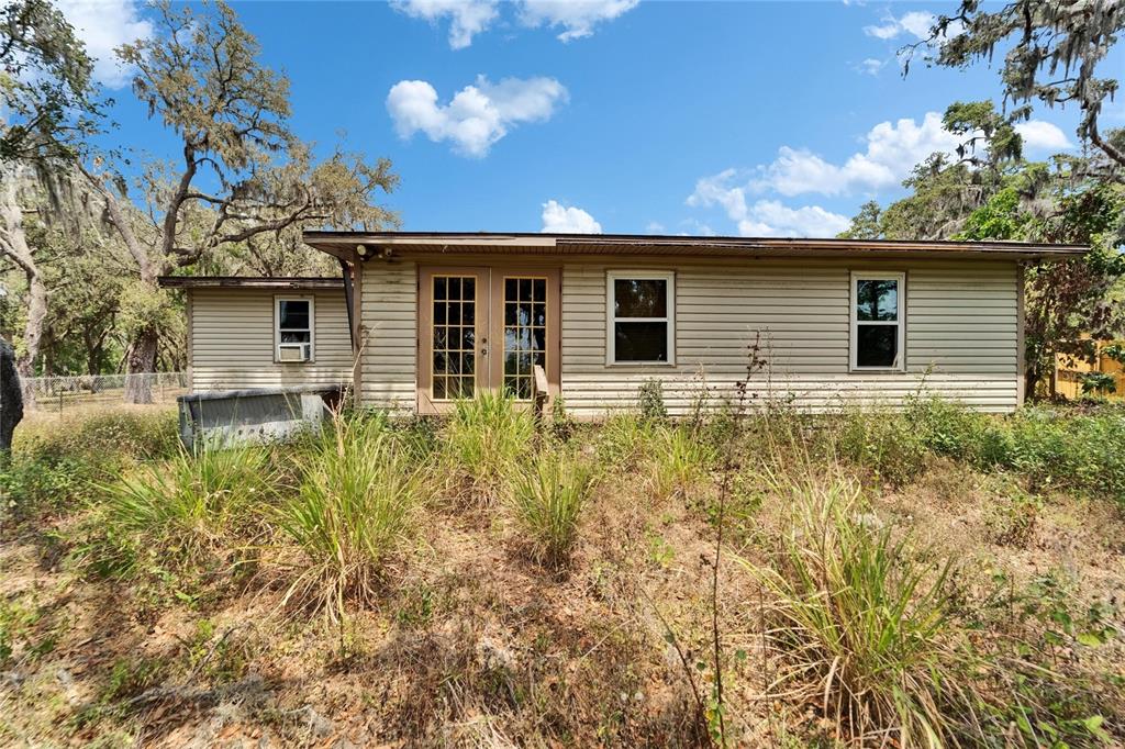 13907 Raulerson Road, Unit PARCEL A Riverview, FL 33569 - Photo 29 of 30 a house that has a lot of plants in it