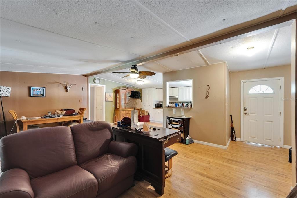 13907 Raulerson Road, Unit PARCEL A Riverview, FL 33569 - Photo 10 of 30 a living room with furniture kitchen and a table