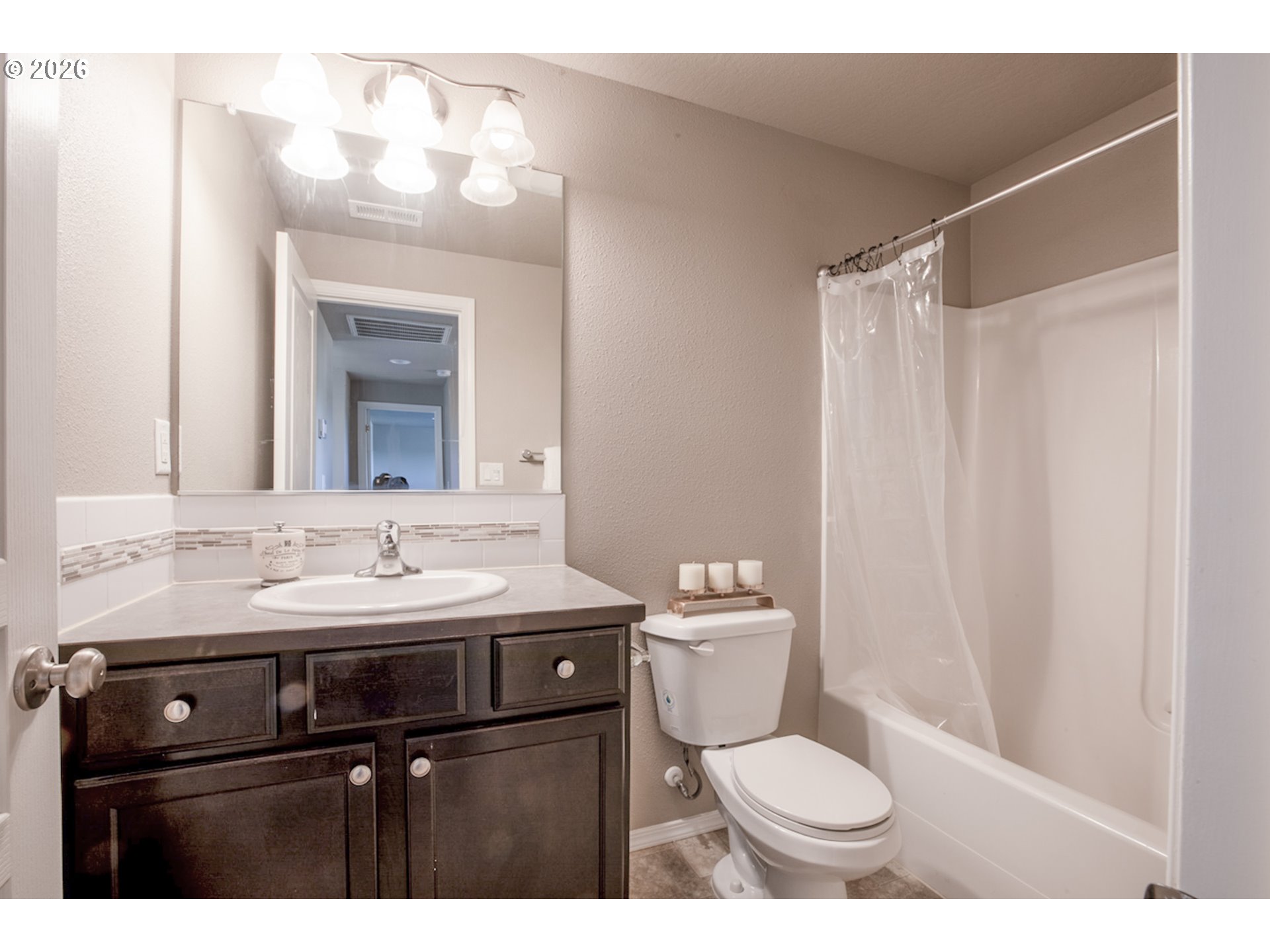 2952 Shelby Way Eugene, OR 97404 - Photo 20 of 25 a bathroom with a sink toilet and mirror