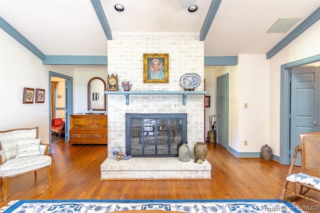 437 Taskmaker Lane Reedville, VA 22539 - Photo 11 of 38 Gas fireplace and hardwood floors