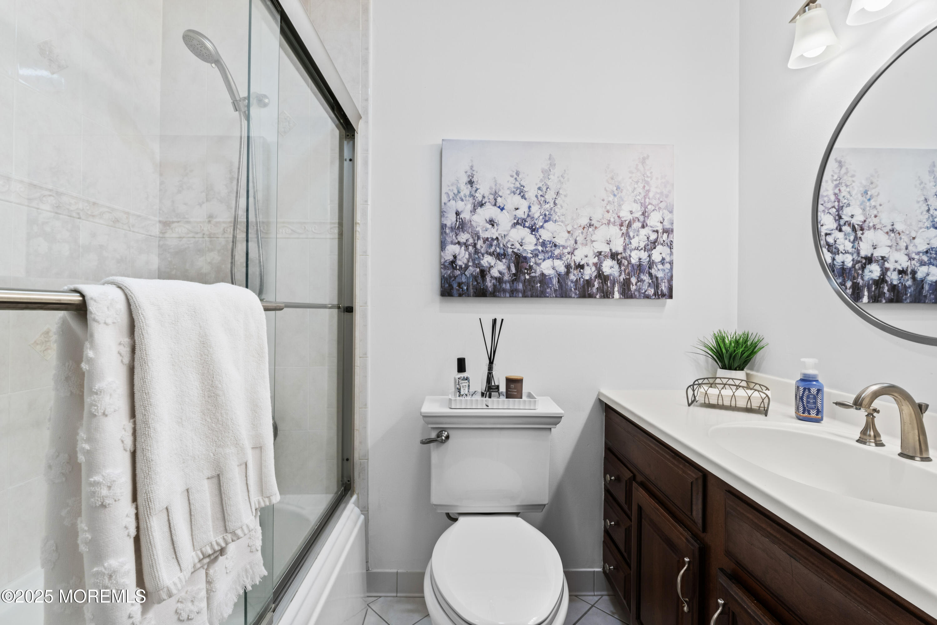 110 Jumping Brook Road Lincroft, NJ 07738 - Photo 35 of 48 a bathroom with a sink mirror vanity and toilet