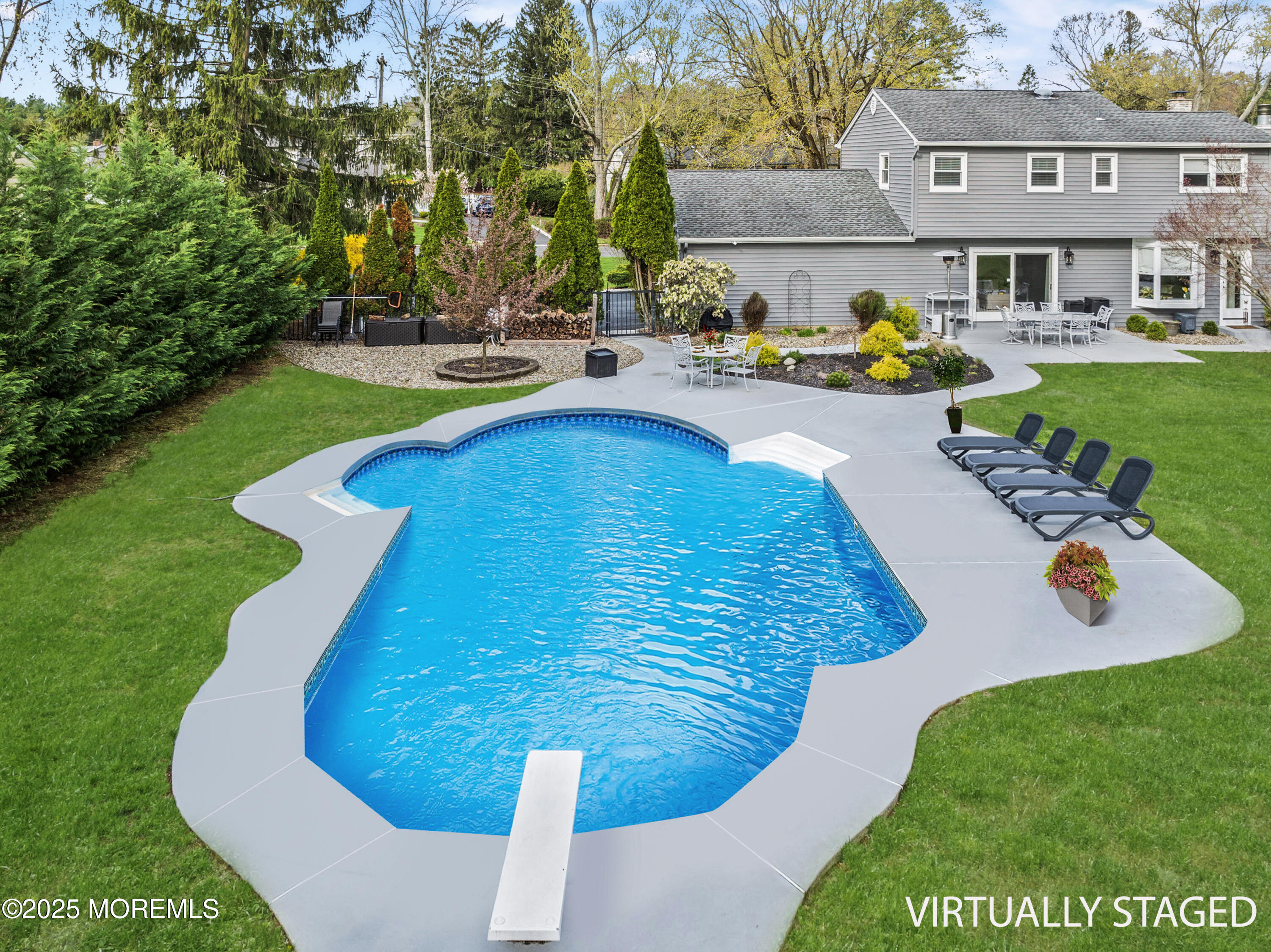 110 Jumping Brook Road Lincroft, NJ 07738 - Photo 8 of 48 a view of swimming pool with outdoor seating