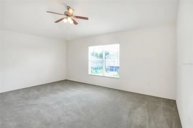 a bathroom with a shower and toilet