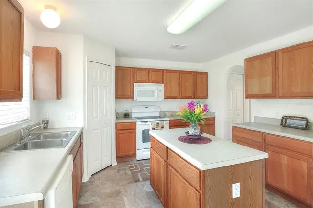 a view of a hallway with white walls