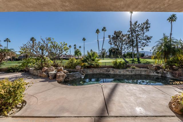 a view of a porch with seating space