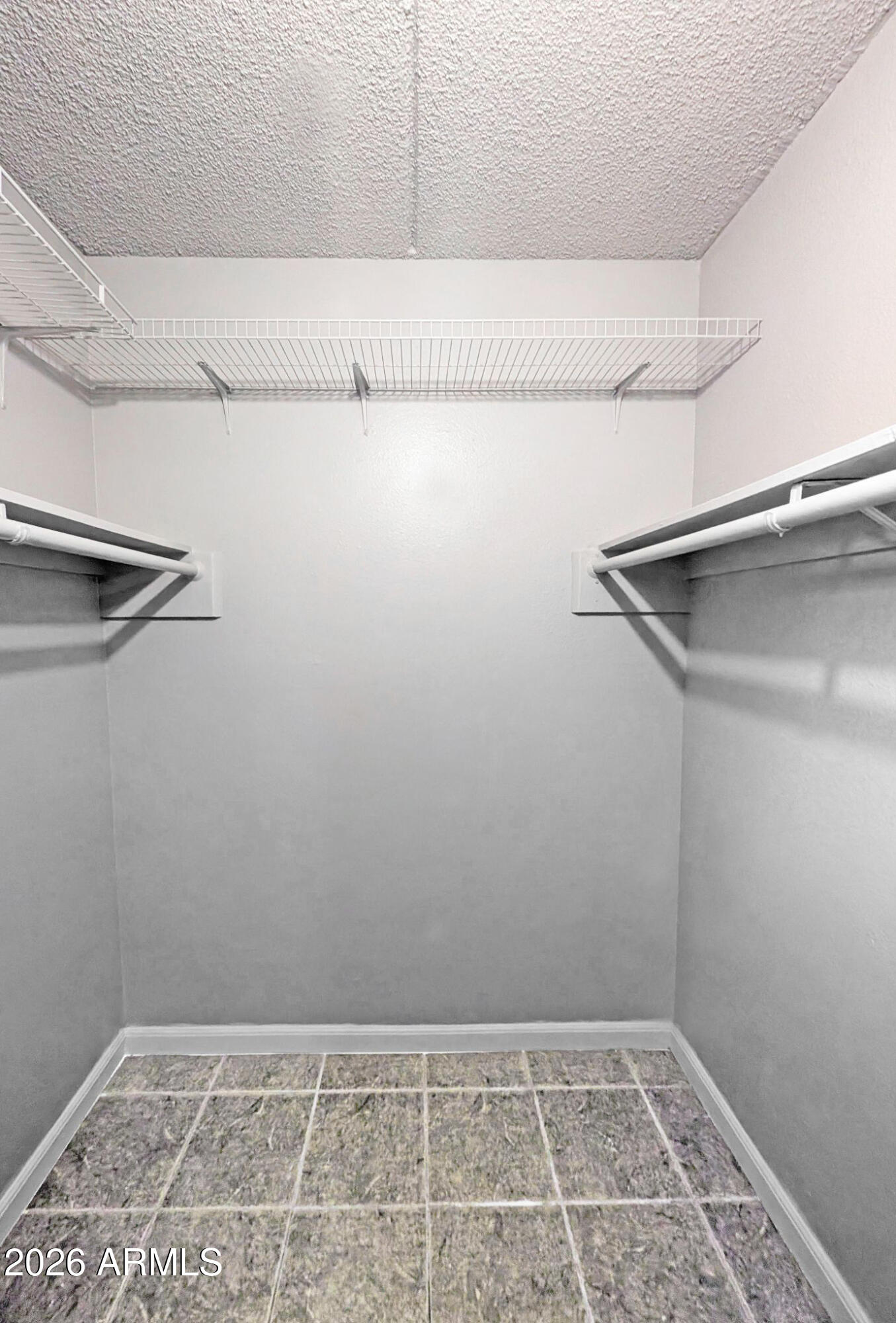 1018 East Osborn Road, Unit A Phoenix, AZ 85014 - Photo 6 of 18 a view of a room with racks on the wall