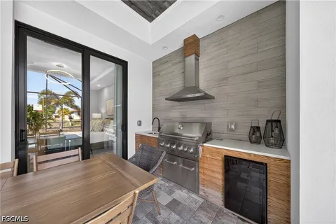 a kitchen with a stove and a refrigerator