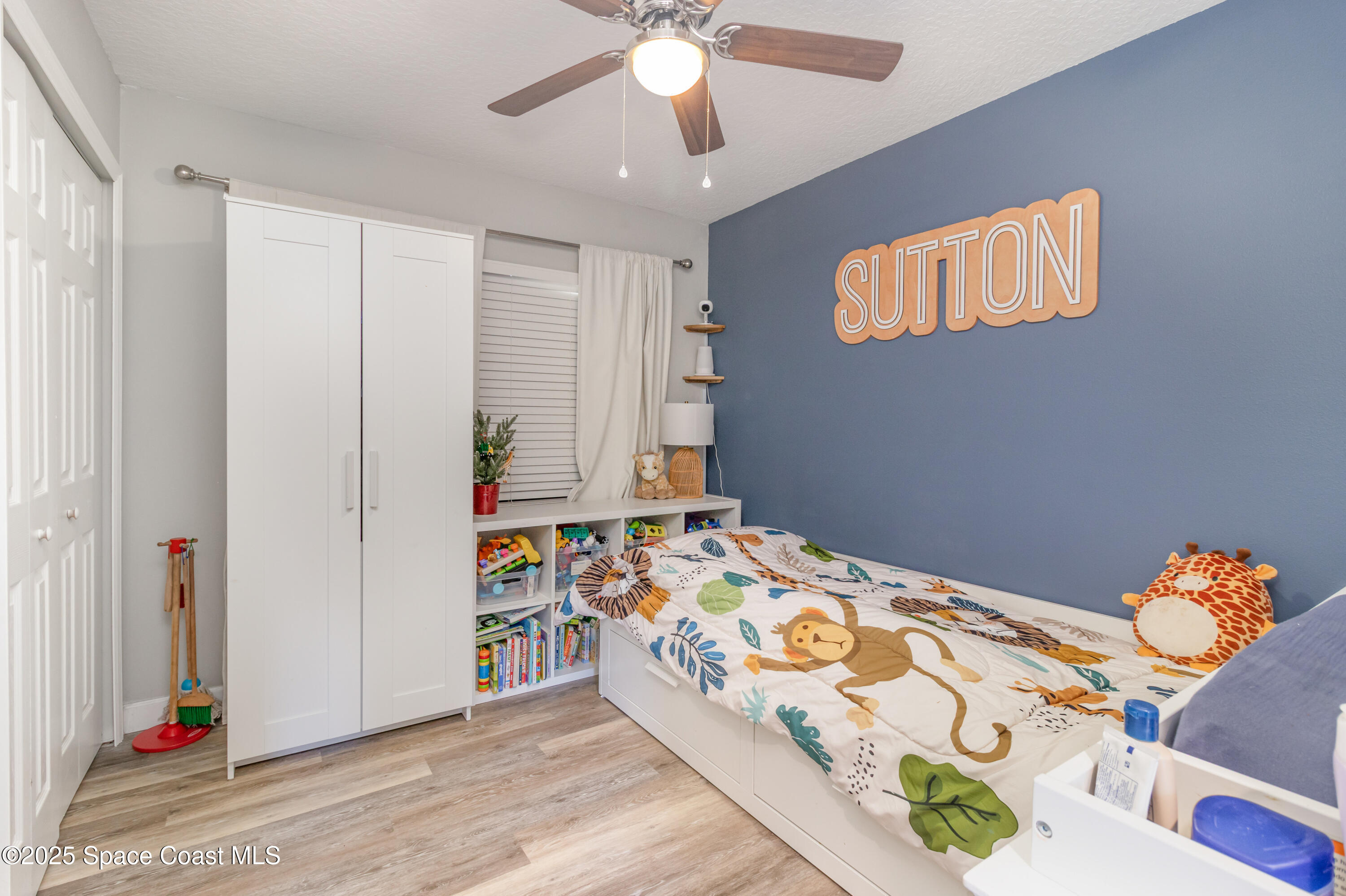 964 Bucknell Place Rockledge, FL 32955 - Photo 17 of 30 a bedroom with bed and a window