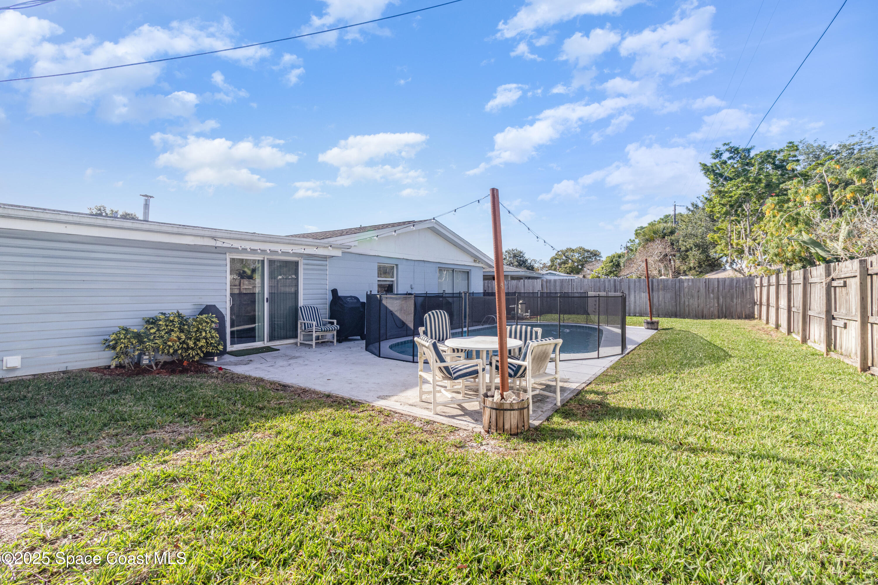 964 Bucknell Place Rockledge, FL 32955 - Photo 25 of 30 a view of a house with backyard and sitting area