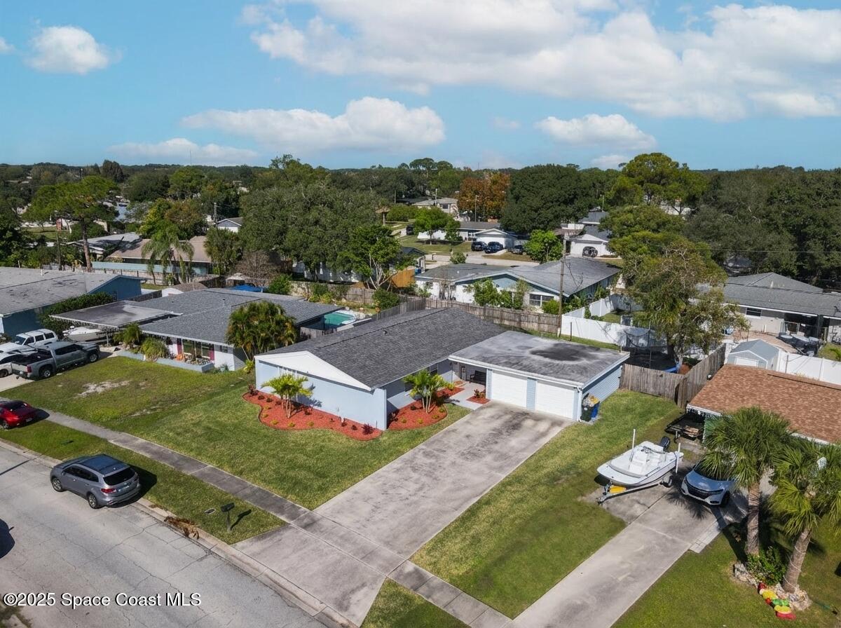 964 Bucknell Place Rockledge, FL 32955 - Photo 29 of 30 an aerial view of a house with garden