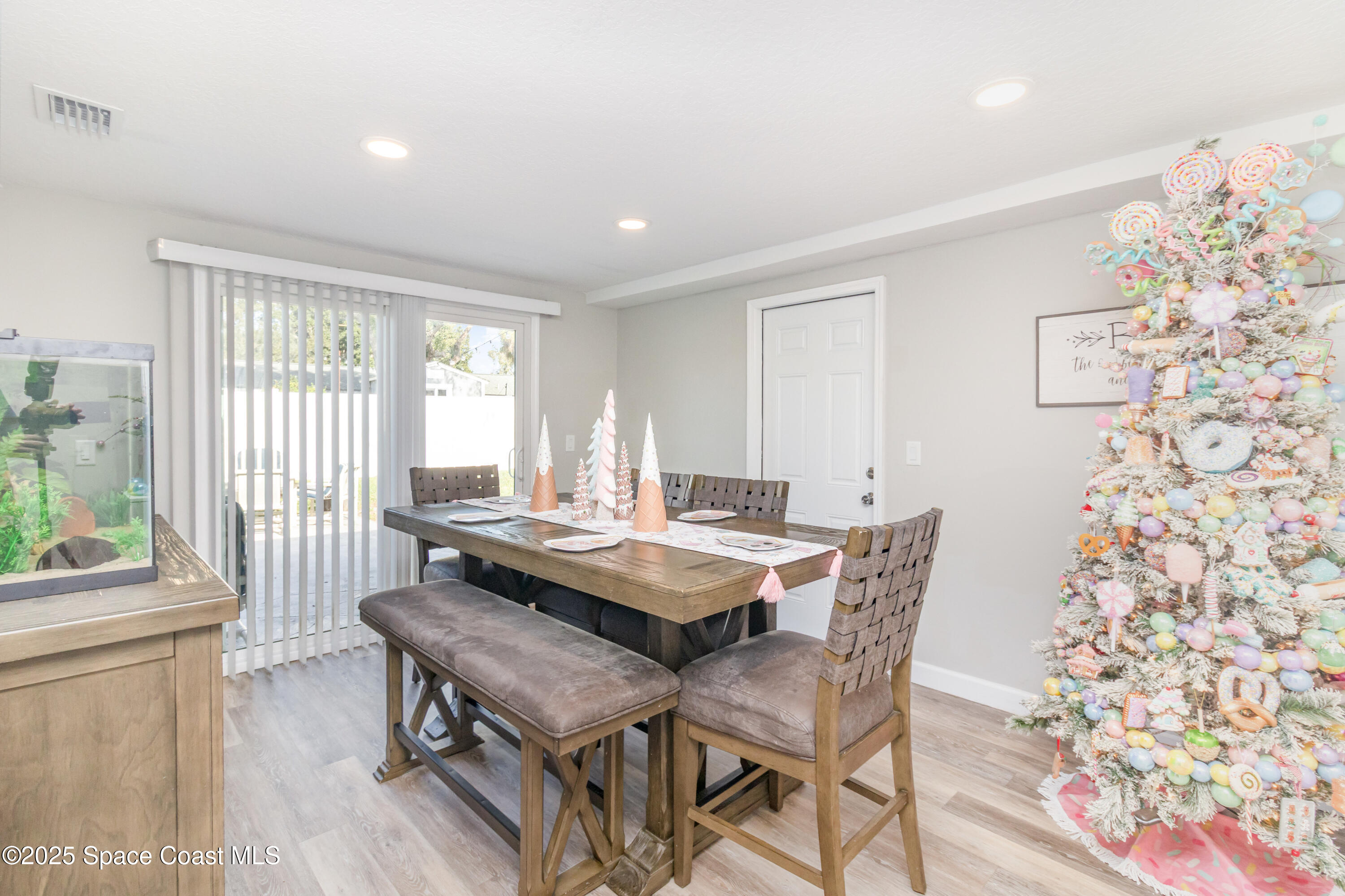 964 Bucknell Place Rockledge, FL 32955 - Photo 9 of 30 a view of a dining room with furniture window and outside view