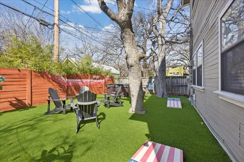 a view of a bench in a backyard