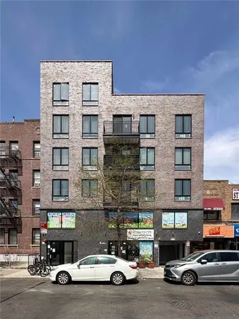 a car parked in front of a building