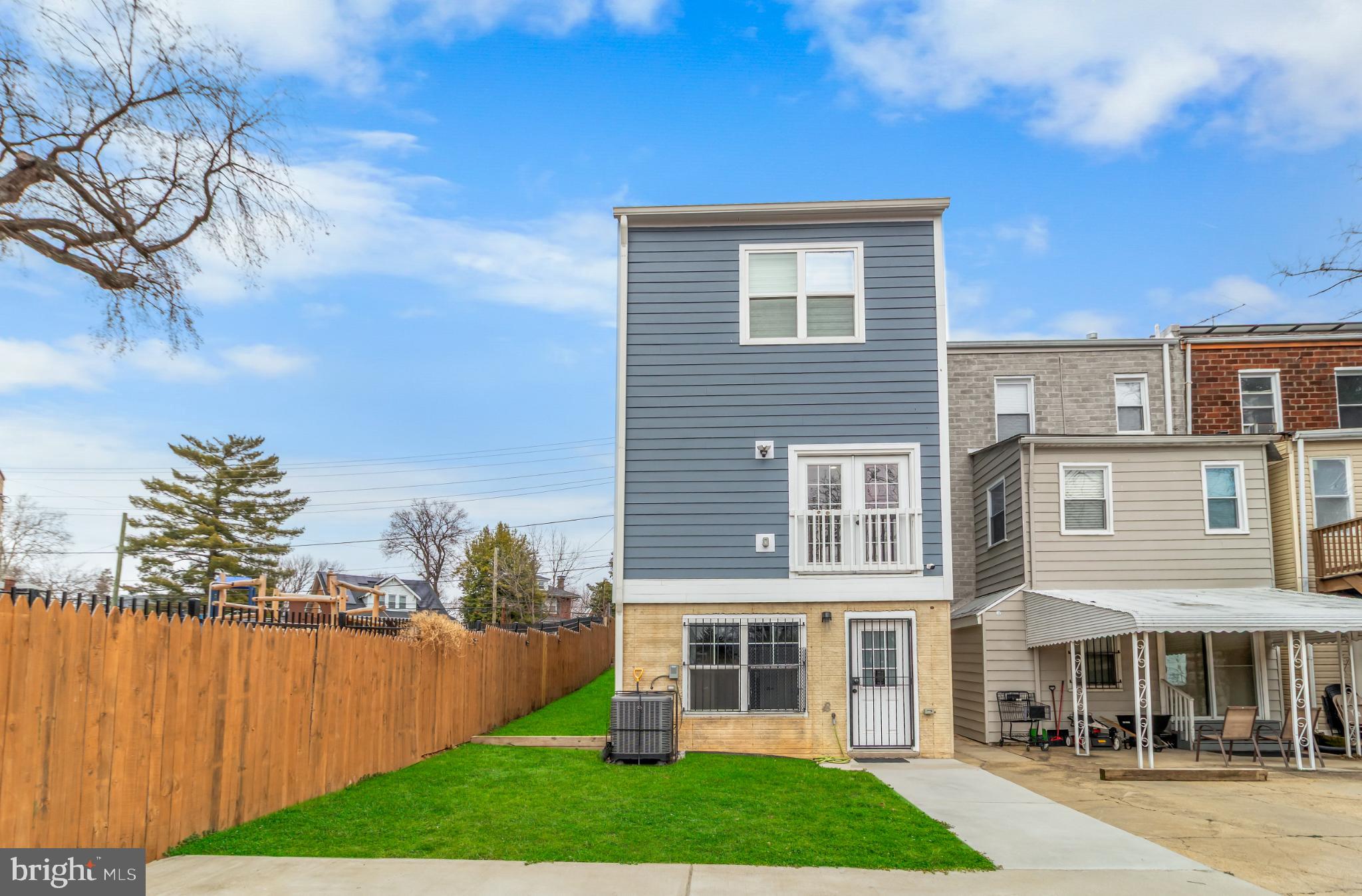 2405 Naylor Road Southeast Washington, DC 20020 - Photo 20 of 23 a view of a house with a yard