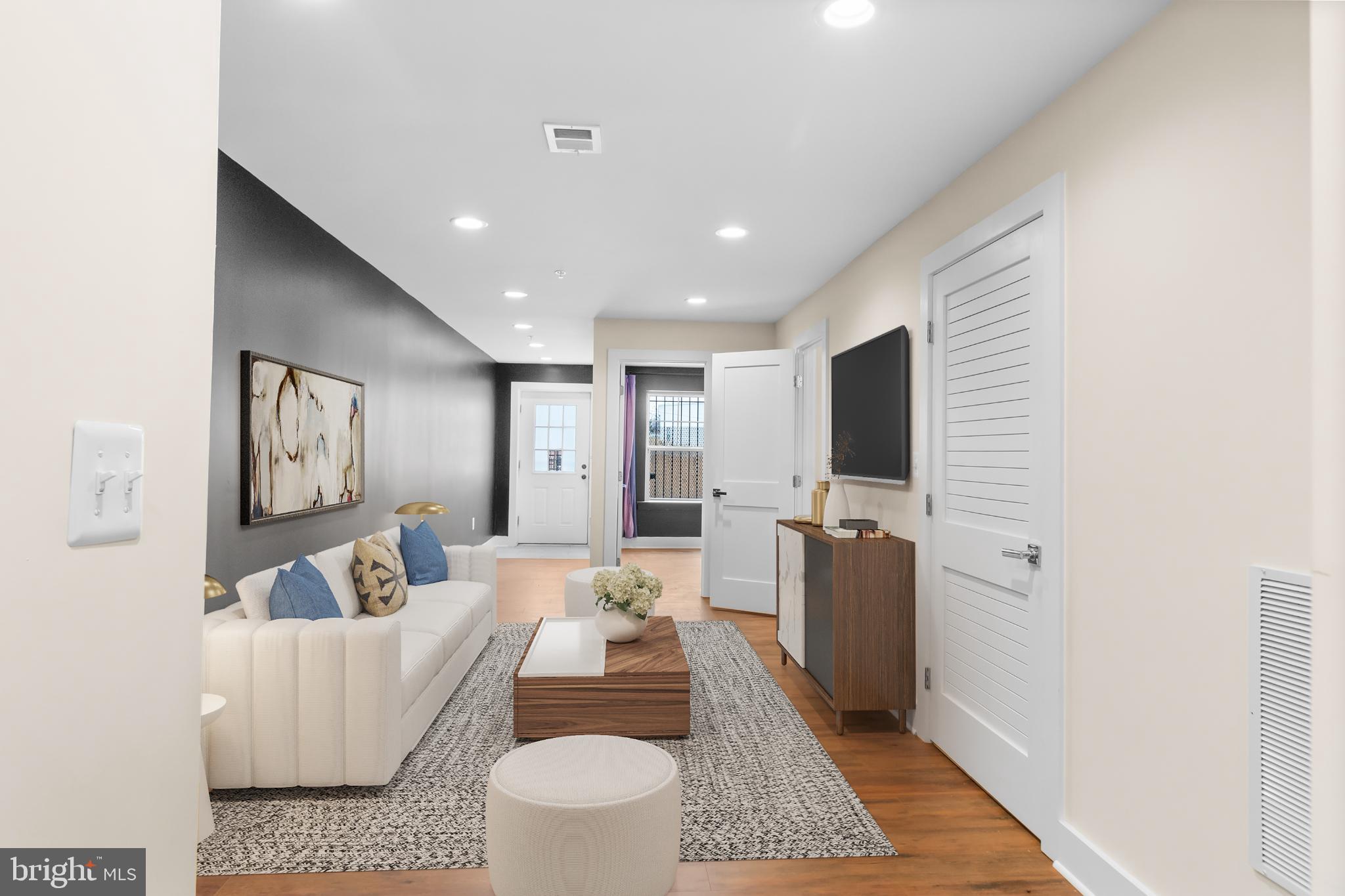 2405 Naylor Road Southeast Washington, DC 20020 - Photo 5 of 23 a living room with furniture and a rug