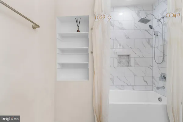 a bathroom with a bathtub