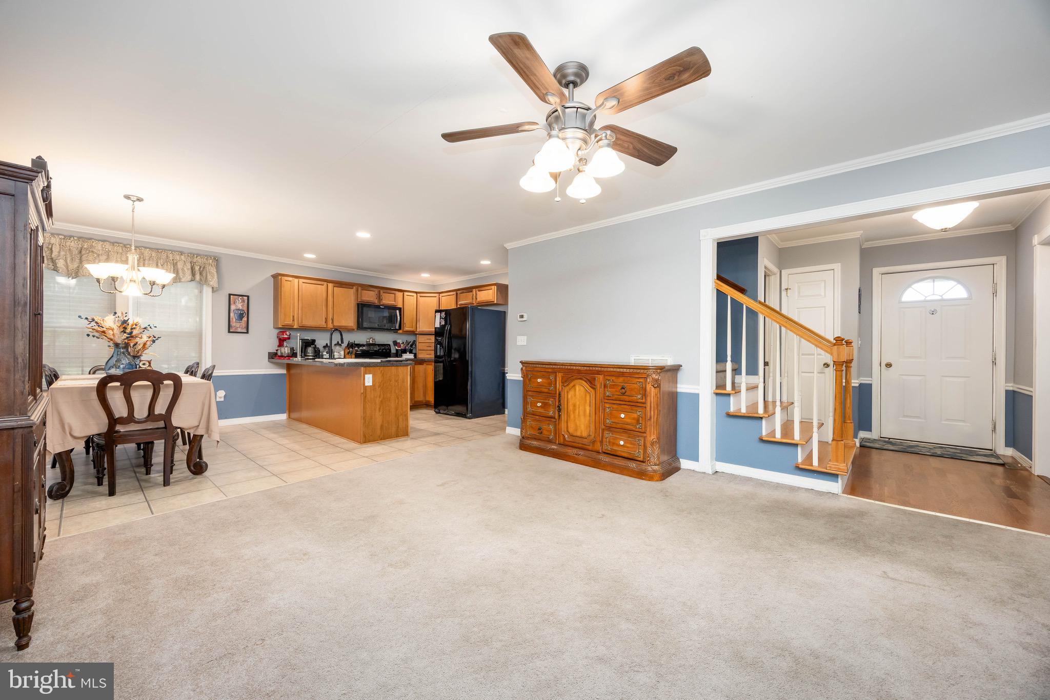 613 Lakeside Drive Salisbury, MD 21801 - Photo 16 of 50 a view of a livingroom with furniture and a kitchen