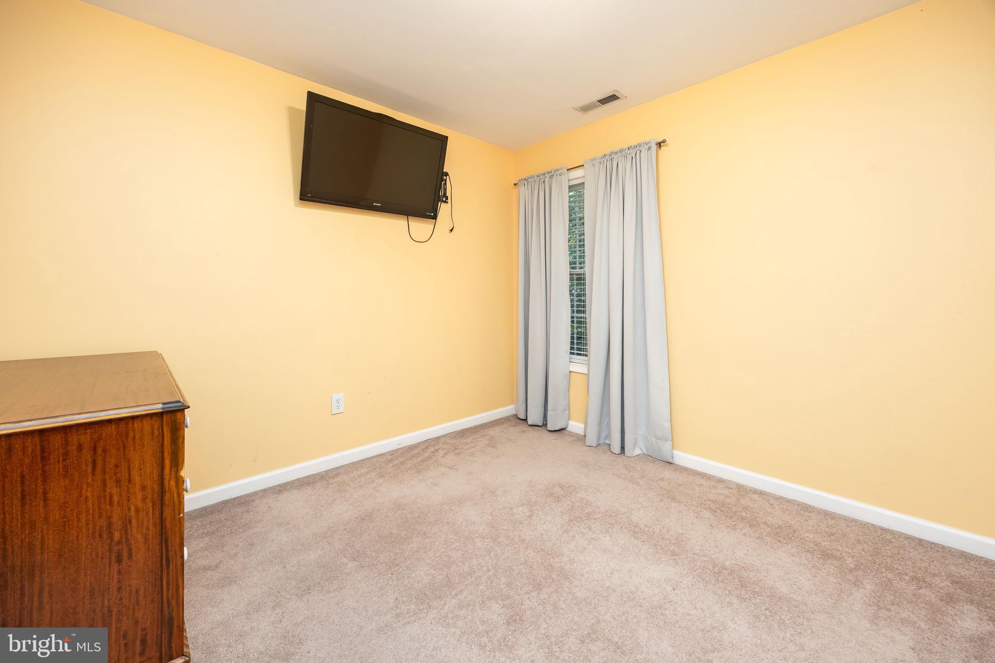 613 Lakeside Drive Salisbury, MD 21801 - Photo 34 of 50 an empty room with windows