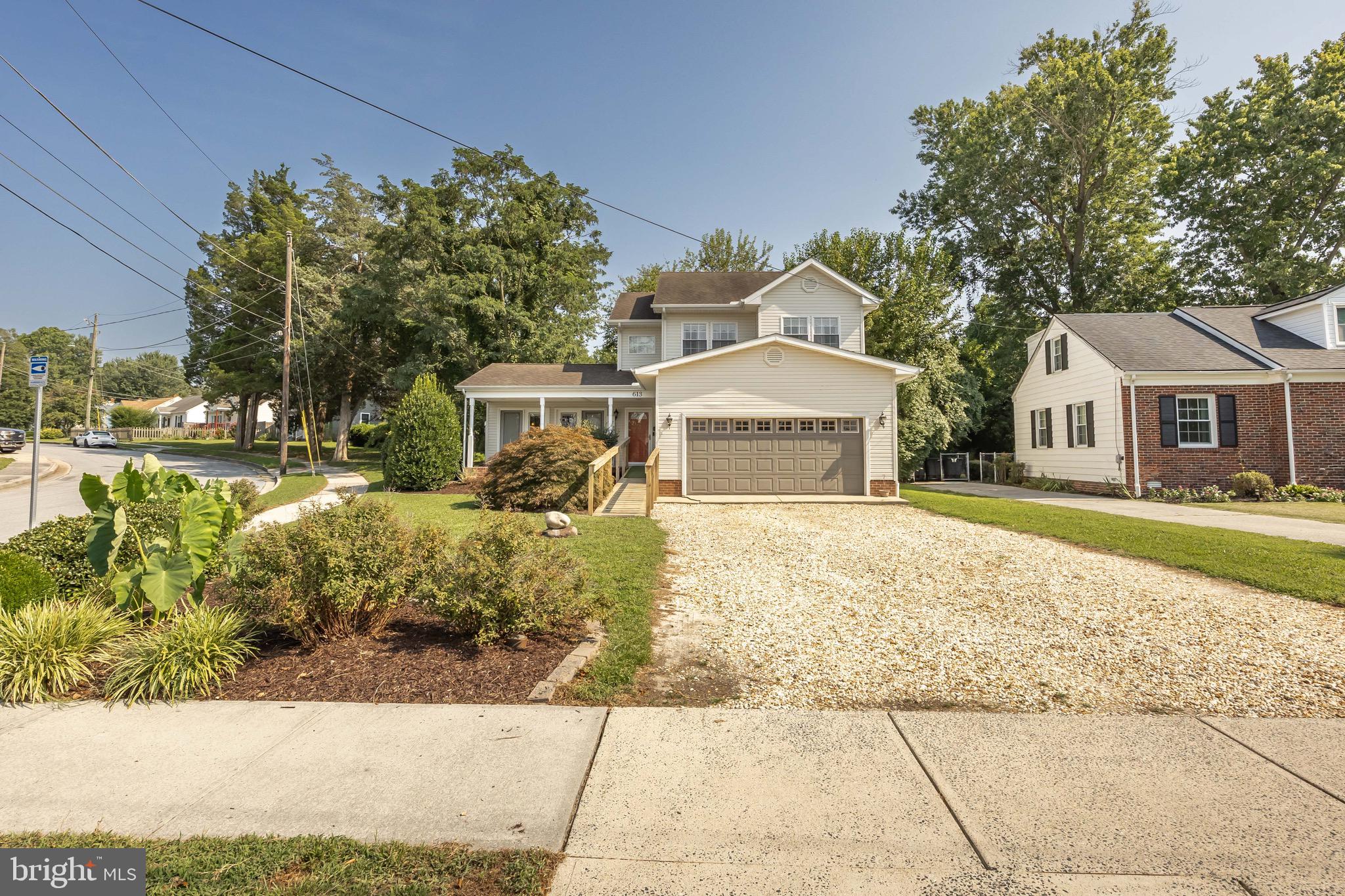 613 Lakeside Drive Salisbury, MD 21801 - Photo 44 of 50 a front view of a house with a yard