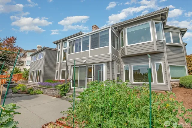 a view of a utility room with curtain and a wooden door