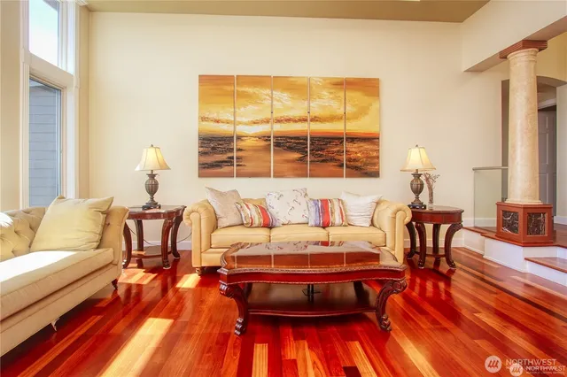a living room with furniture and a table