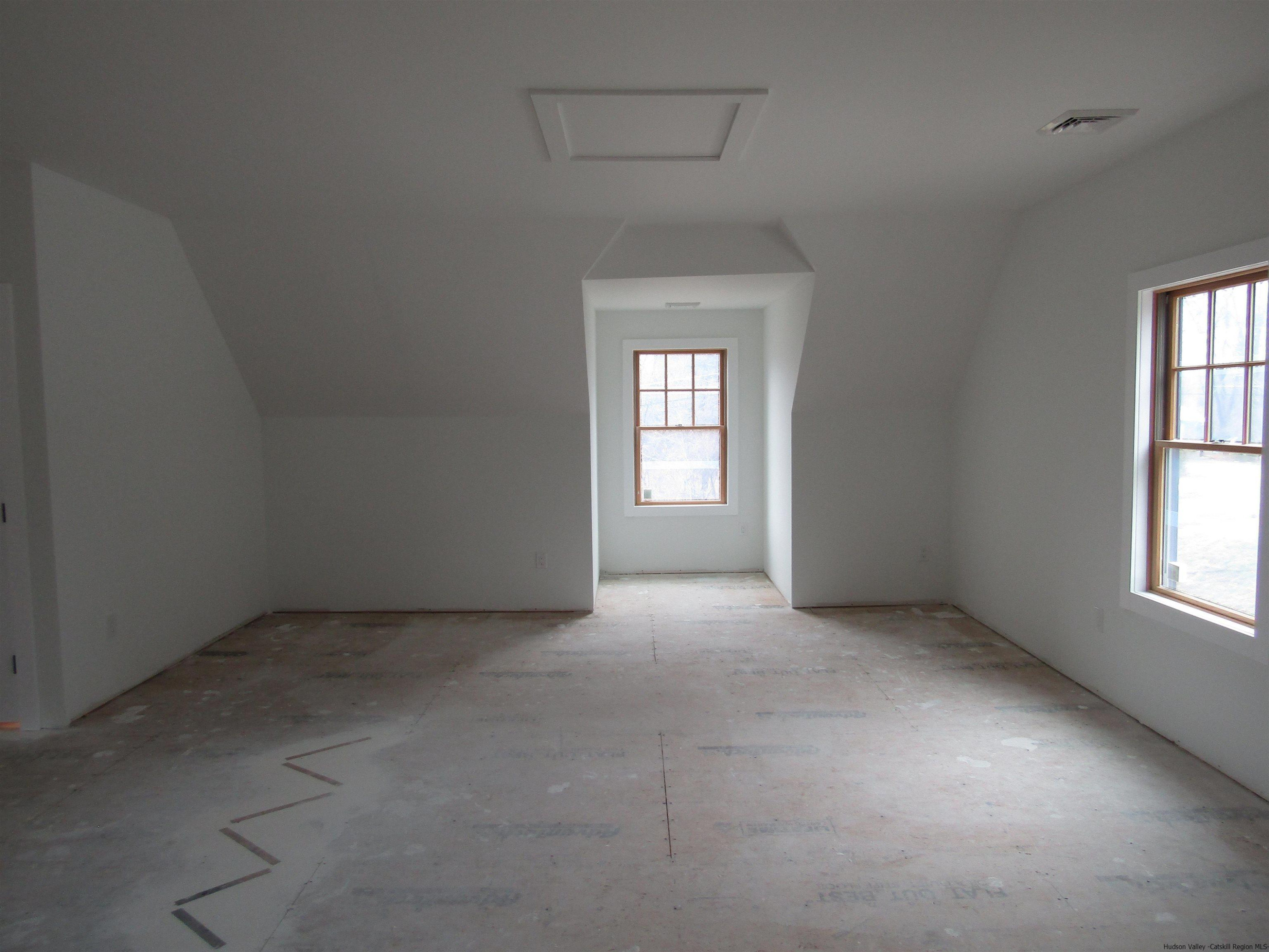 51 Duck Pond Road Stone Ridge, NY 12484 - Photo 26 of 31 an empty room with windows