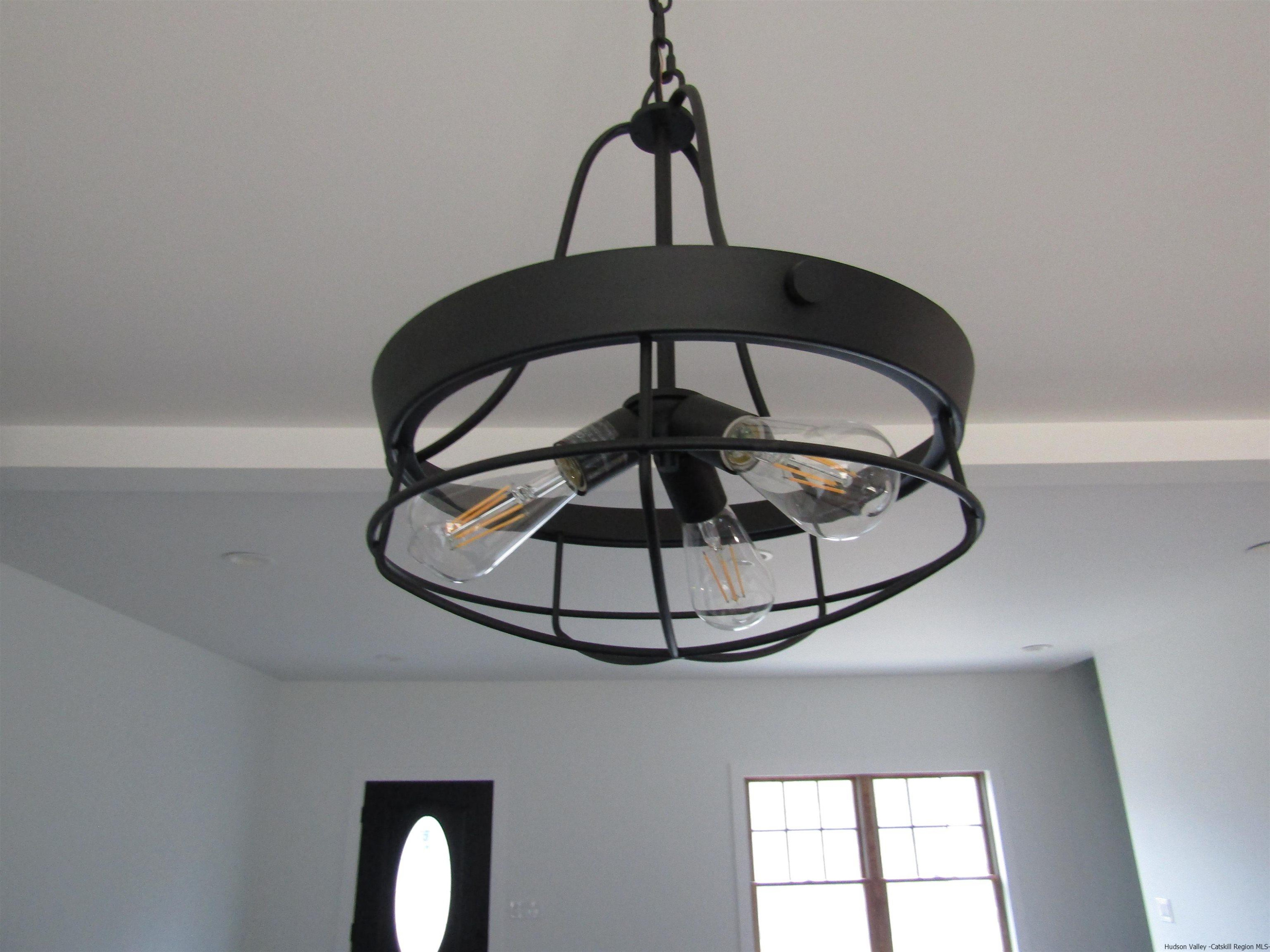 51 Duck Pond Road Stone Ridge, NY 12484 - Photo 30 of 31 a view of a chandelier fan in a bathroom