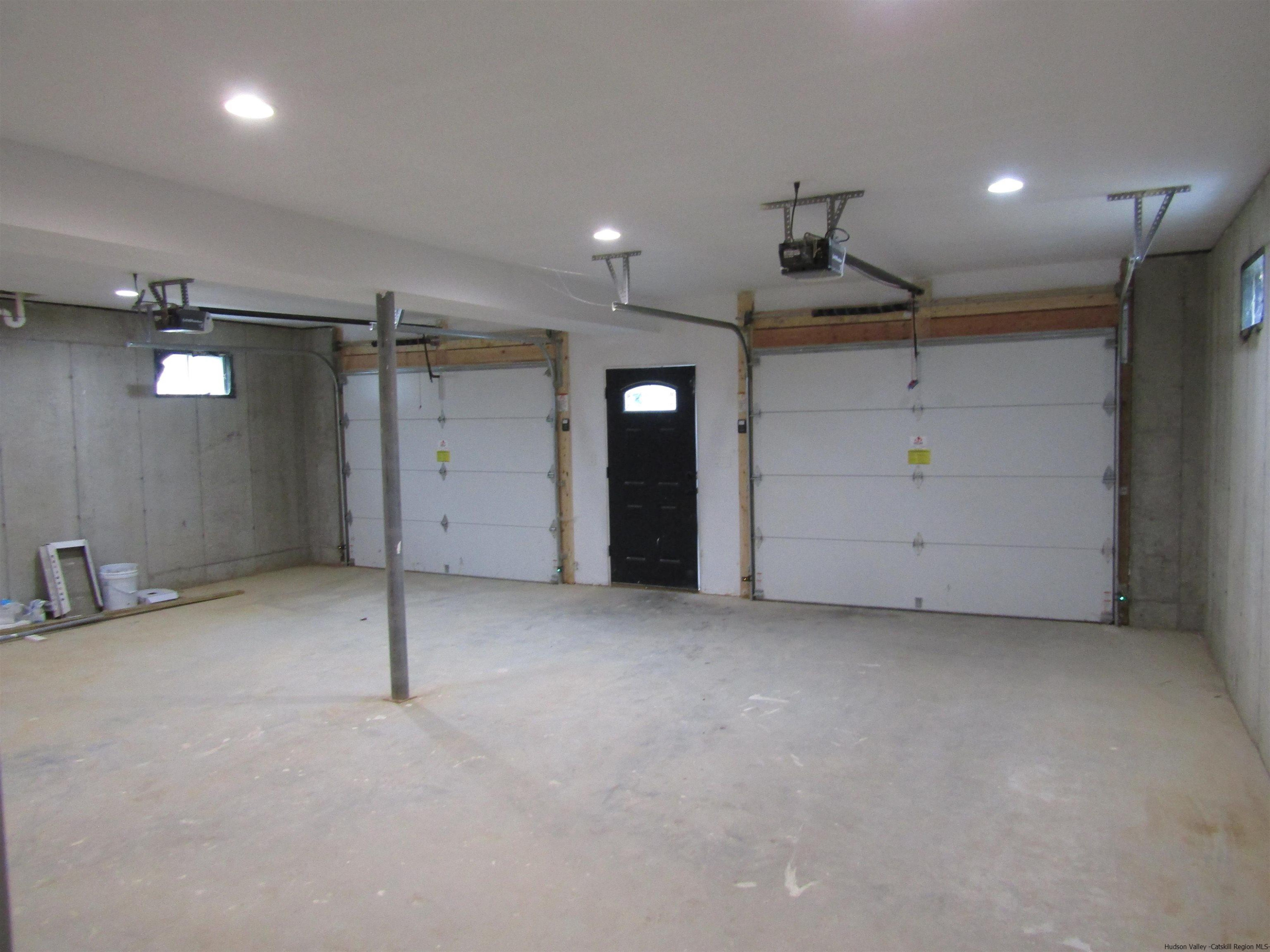 51 Duck Pond Road Stone Ridge, NY 12484 - Photo 7 of 31 an empty room with windows