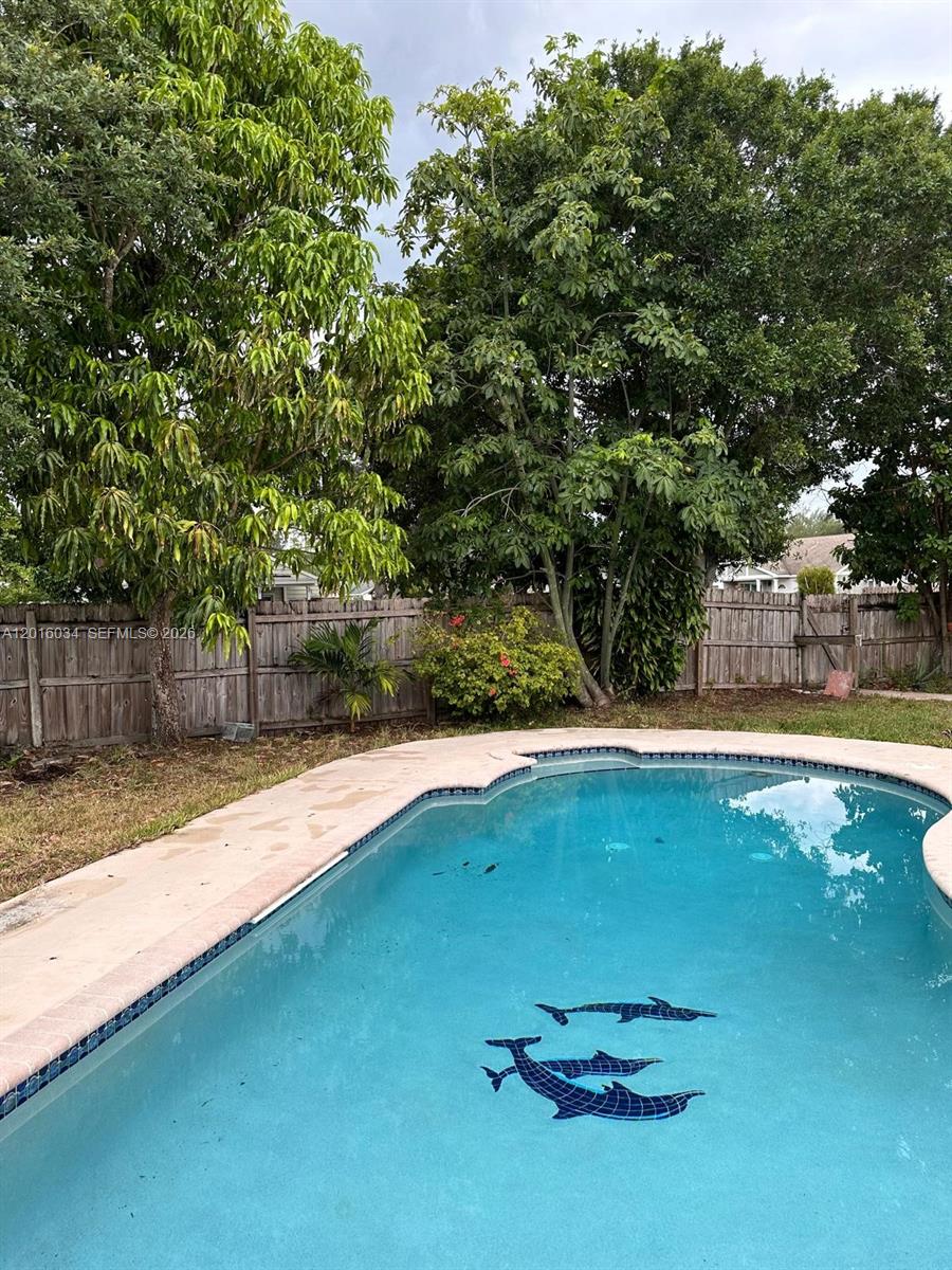 11143 Model Circle East Boca Raton, FL 33428 - Photo 11 of 15 a view of a outdoor space with a swimming pool