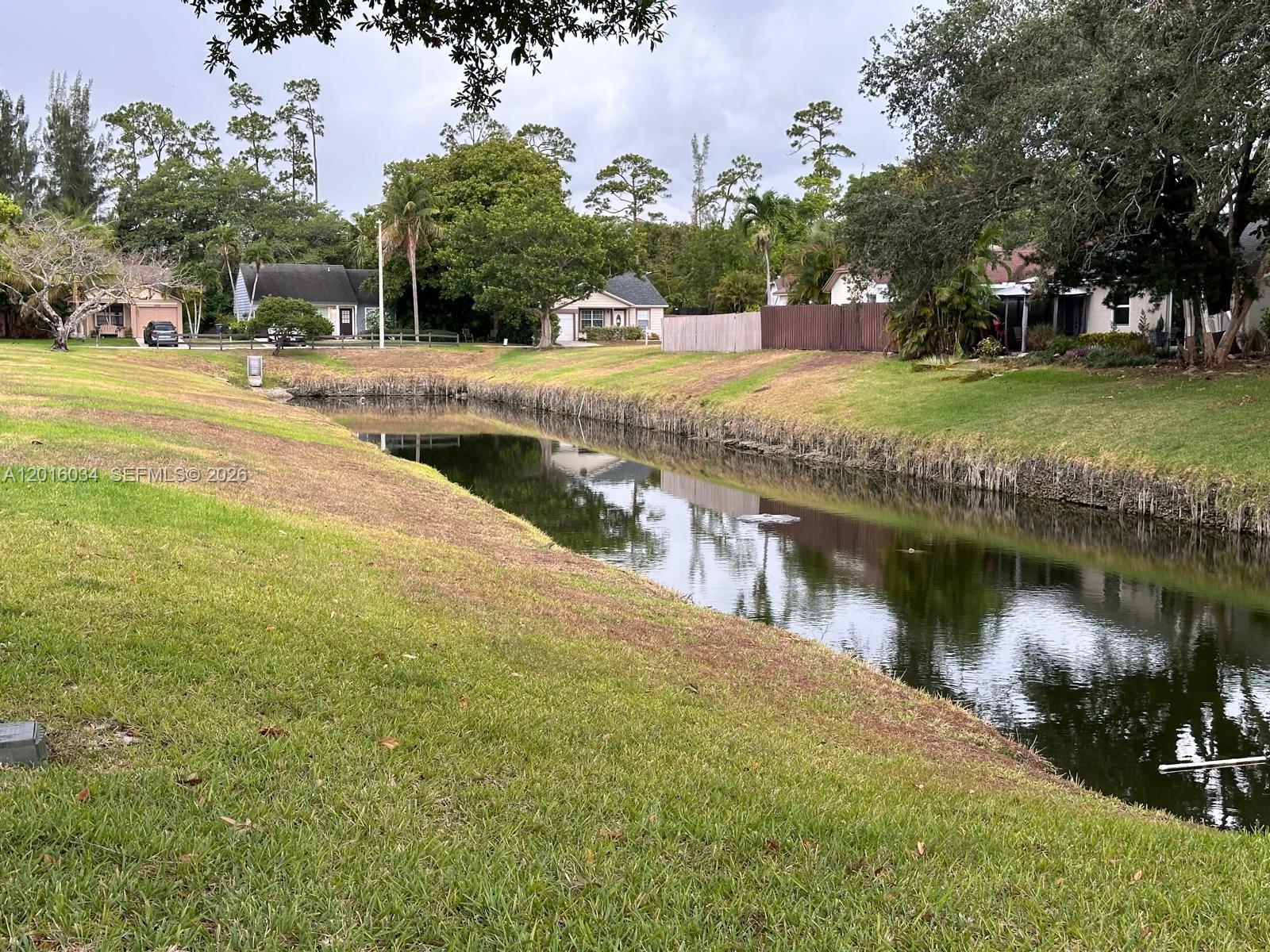11143 Model Circle East Boca Raton, FL 33428 - Photo 12 of 15 a view of a yard with an outdoor space