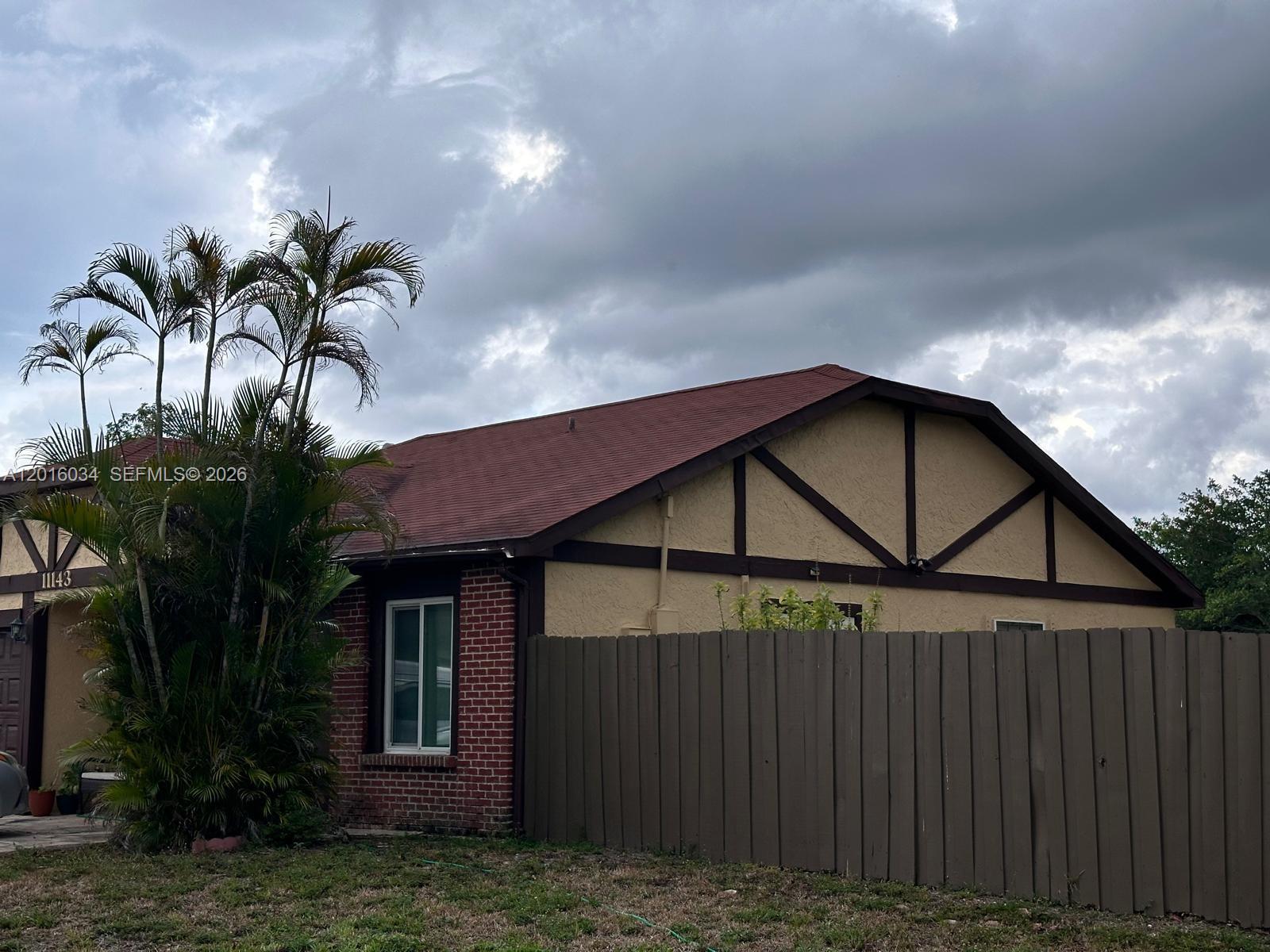 11143 Model Circle East Boca Raton, FL 33428 - Photo 2 of 15 a house with a outdoor space