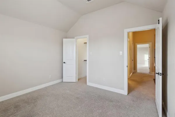 wooden floor and closet area in a room