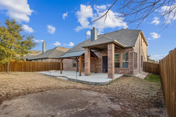 a front view of a house with a porch