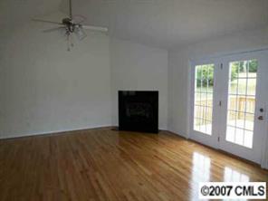 3703 Mack Ballard Road Maiden, NC 28650 - Photo 8 of 8 wooden floor in an empty room with a window