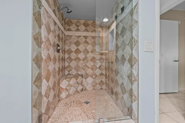 a bathroom with a shower curtain