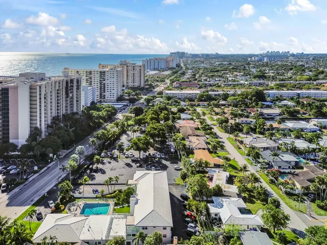 a view of a chairs and table in the garden