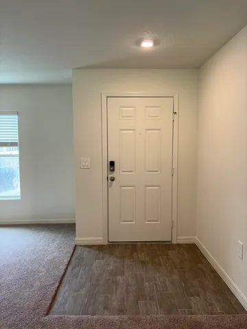 an empty room with a natural light