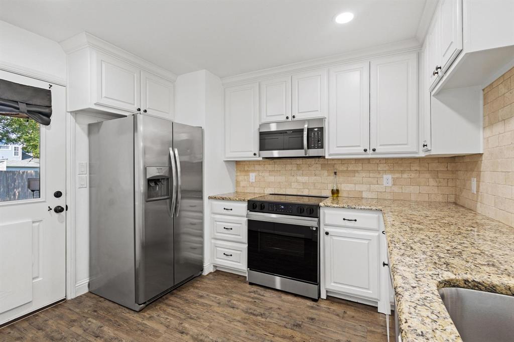 1031 West Gandy Street Denison, TX 75020 - Photo 14 of 33 New fridge and stove