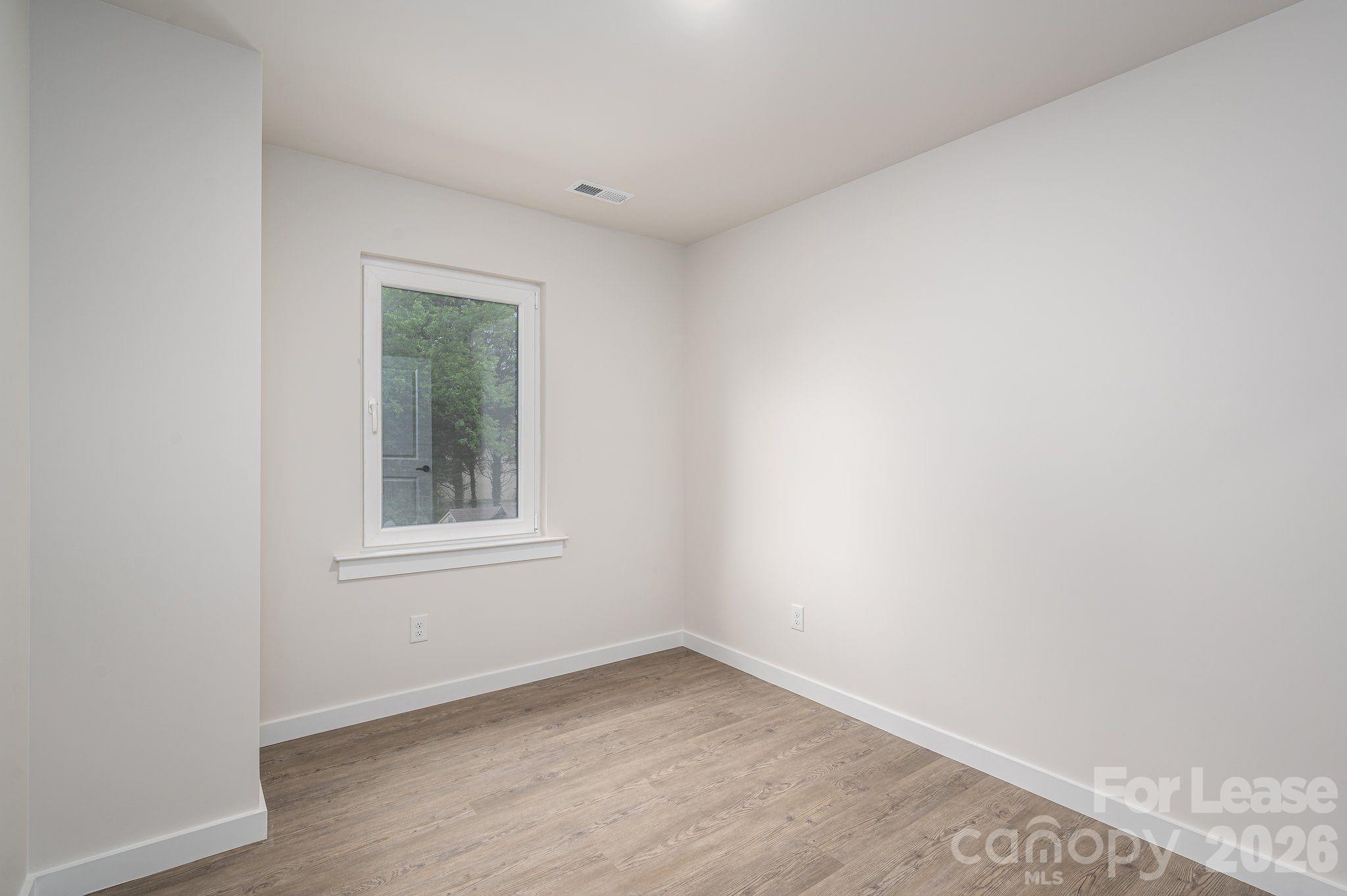 1331 33rd Street Southeast Conover, NC 28613 - Photo 7 of 15 an empty room with a window
