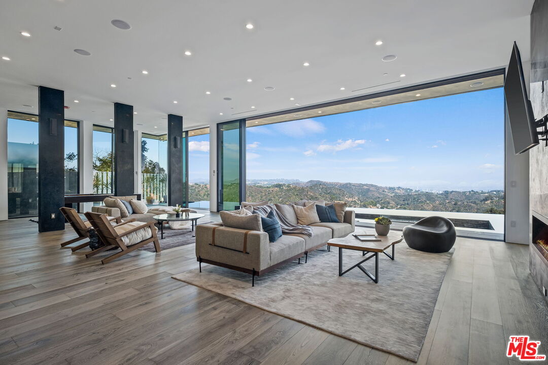 2304 Donella Circle Los Angeles, CA 90077 - Photo 13 of 35 a living room with furniture and a large window
