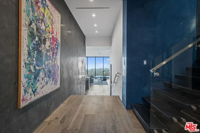 a view of entryway and livingroom