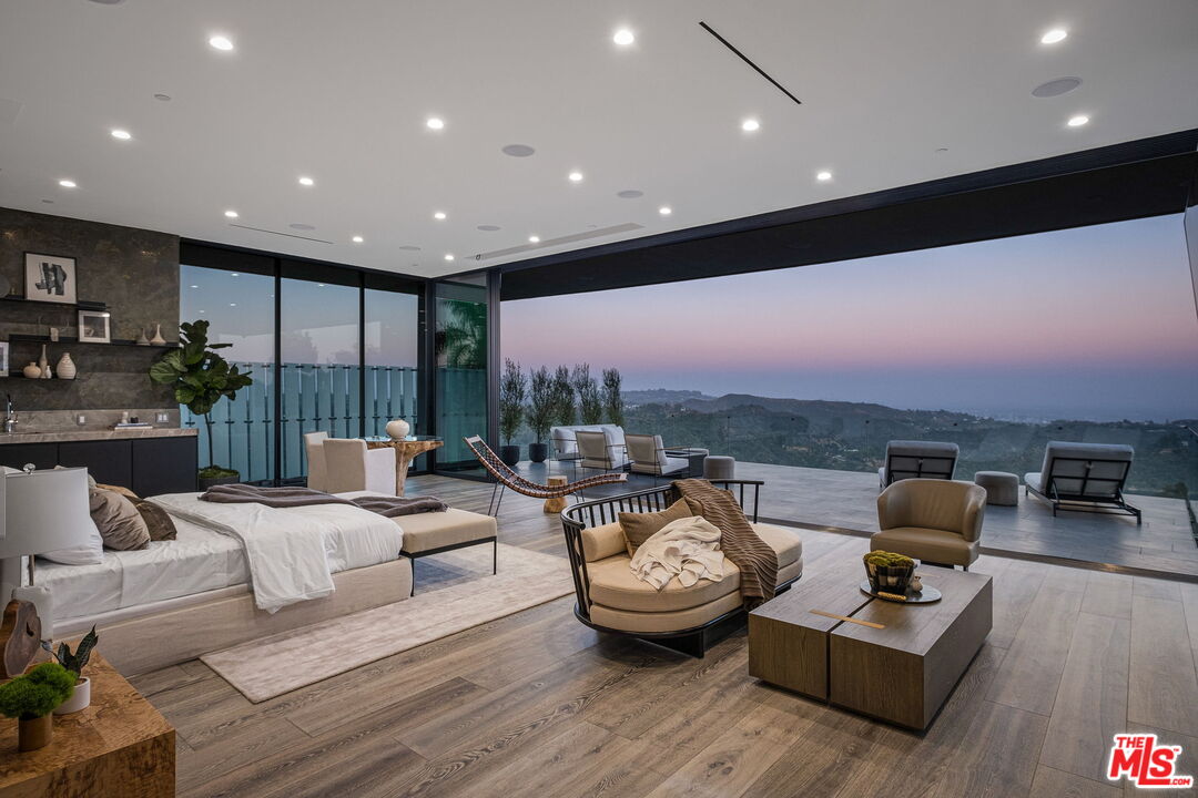 2304 Donella Circle Los Angeles, CA 90077 - Photo 17 of 35 a living room with furniture and a large window