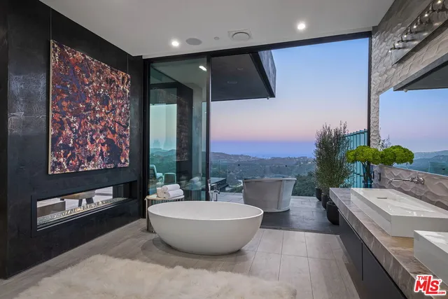 a room with a large window and table